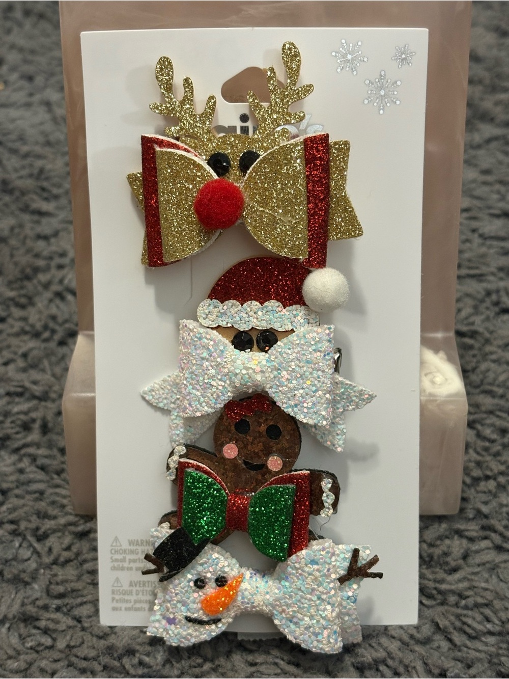 NWT Claire’s set of 4 hair clips - 1 reindeer, 1 Santa, 1 gingerbread man